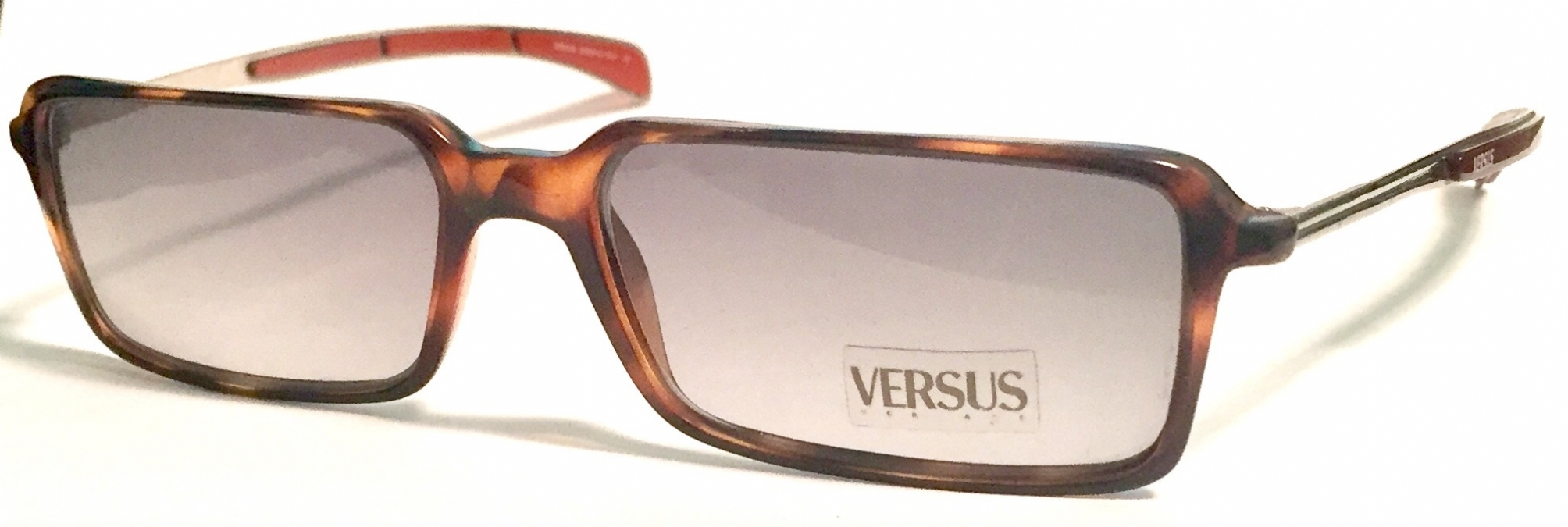 VERSUS  